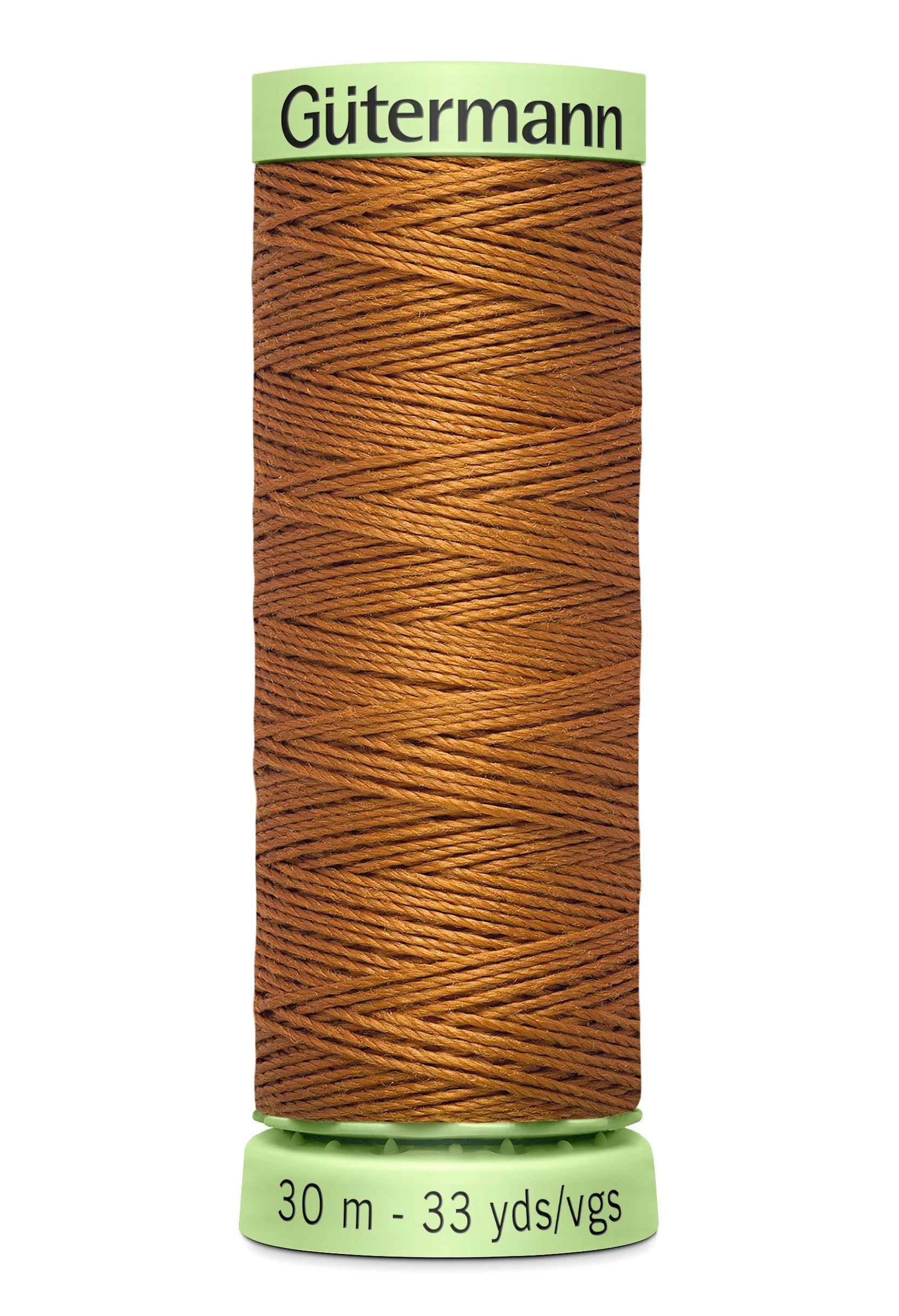 Spool of Gutermann thread on a white background