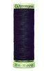 Spool of dark blue thread with green label on a white background