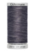 Spool of Gutermann thread on a white background