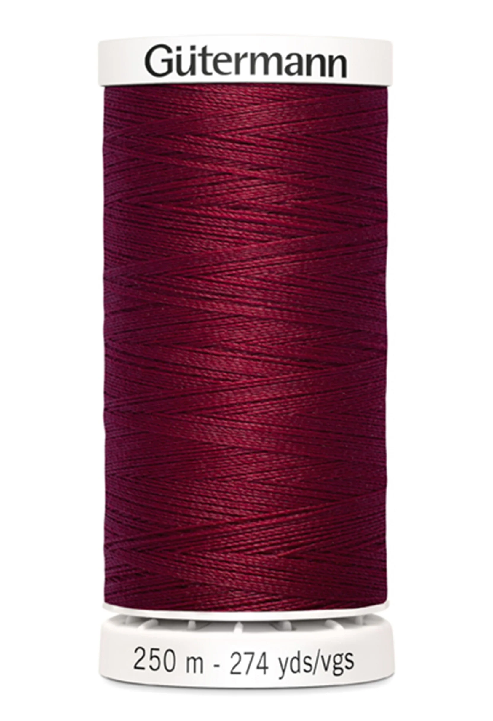 Spool of Gutermann thread in burgundy color on a white background