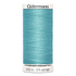 Spool of blue thread with 'Gütermann' branding on a white background