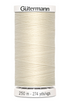 Spool of Gutermann thread on a white background