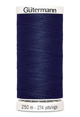 Spool of Gutermann thread on a white background