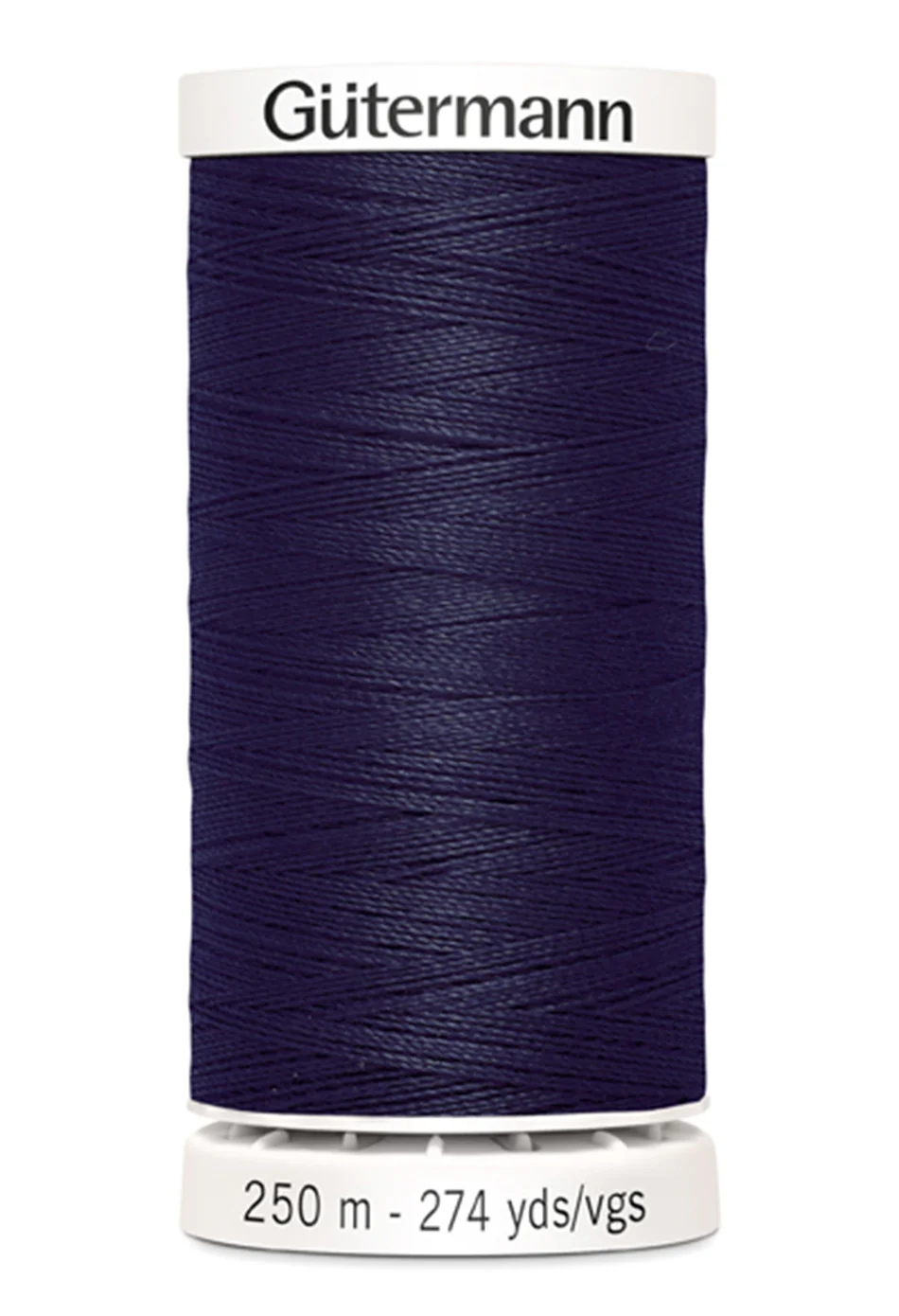 Spool of dark blue Gutermann thread on a white background