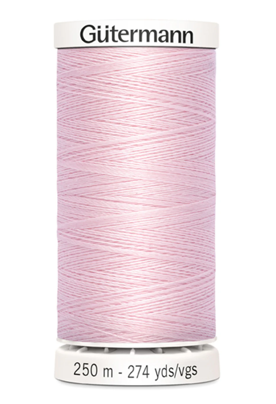 Spool of Gutermann thread in light pink on a white background