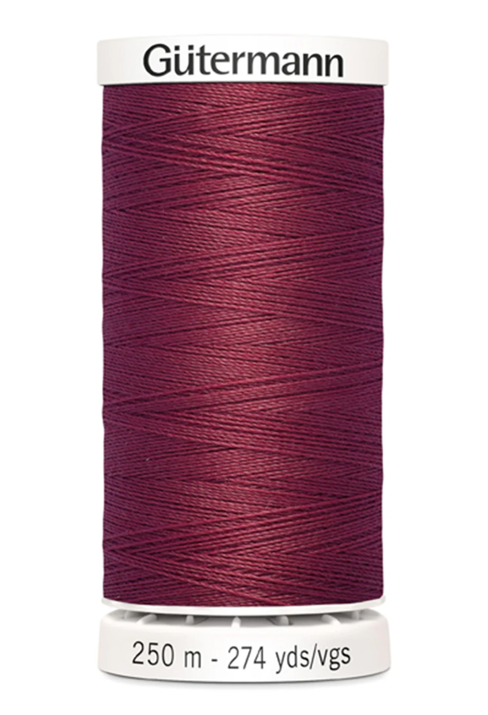 Spool of Gutermann thread on a white background