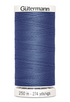 Spool of Gutermann thread on a white background