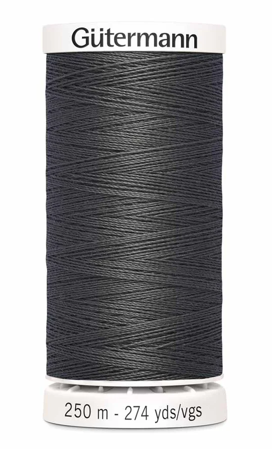 Spool of Gutermann thread on a white background