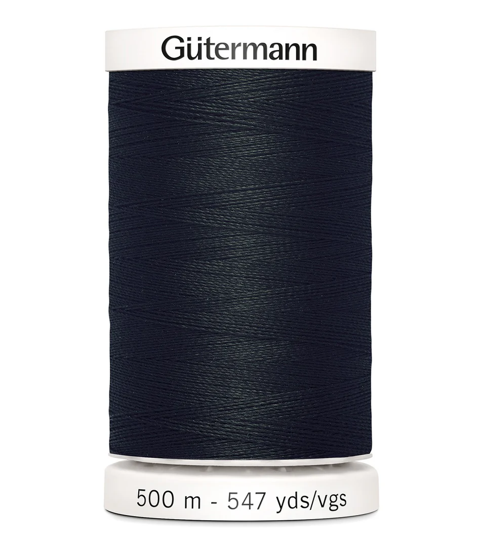 Spool of Gutermann thread on a white background