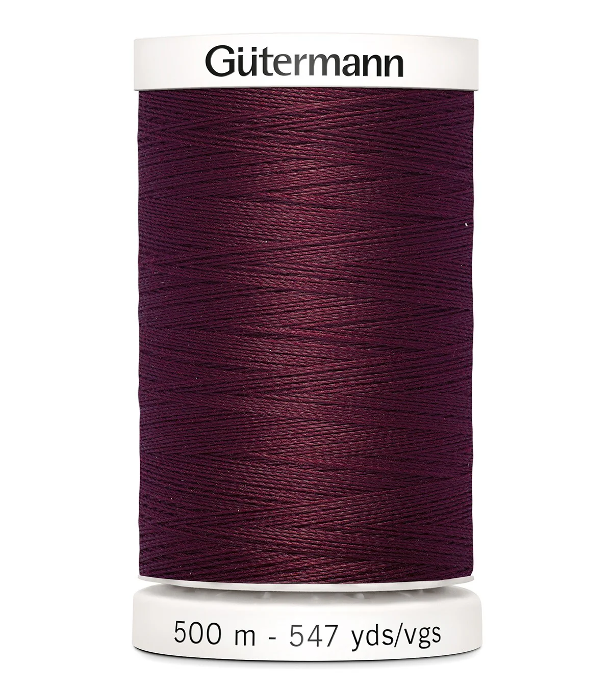 Spool of Gutermann thread on a white background