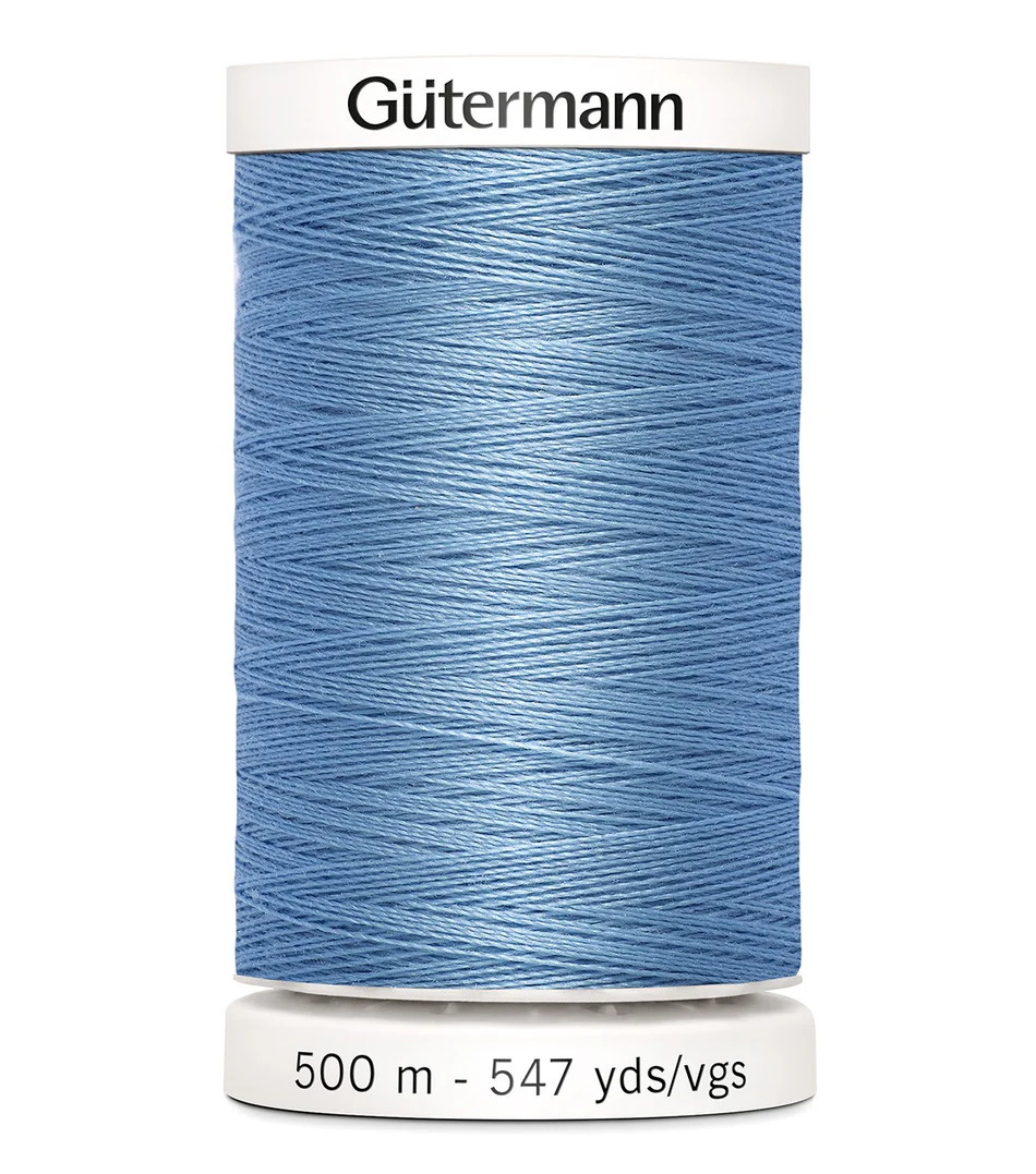 Spool of blue thread with 'Gütermann' branding on a white background