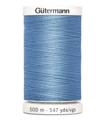Spool of blue thread with 'Gütermann' branding on a white background