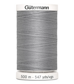 Spool of Gutermann thread on a white background