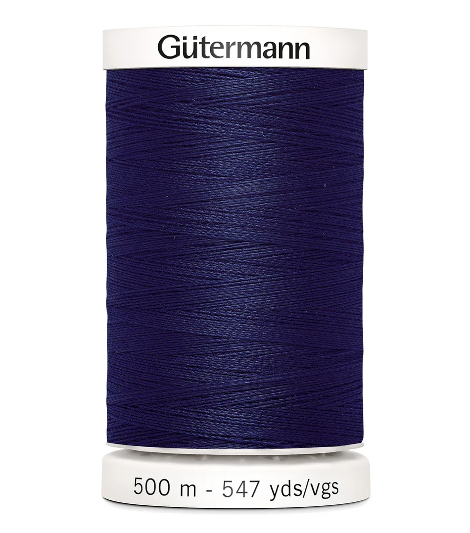 Spool of Gutermann thread in navy blue on a white background