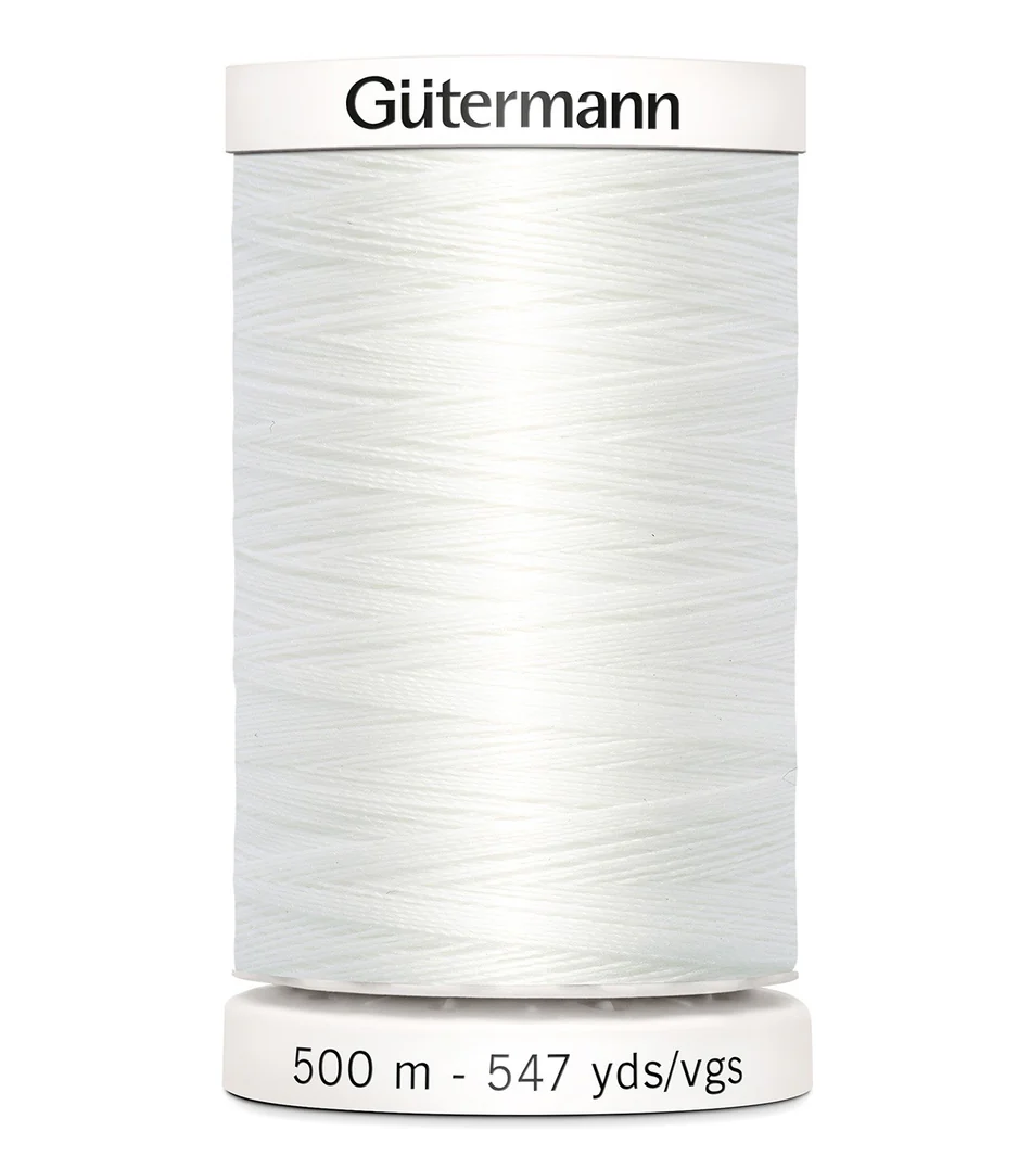 Spool of Gutermann thread on a white background