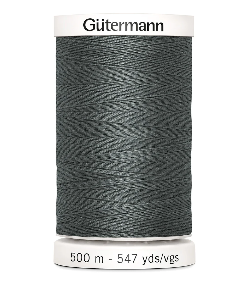 Spool of Gutermann thread on a white background