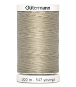 Spool of Gutermann thread on a white background