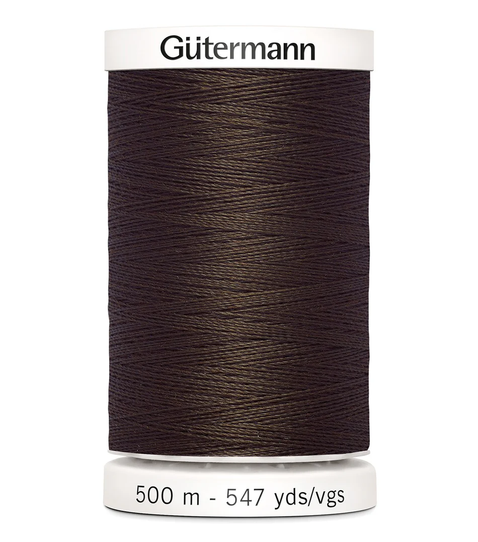 Spool of Gutermann thread on a white background