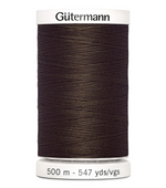 Spool of Gutermann thread on a white background