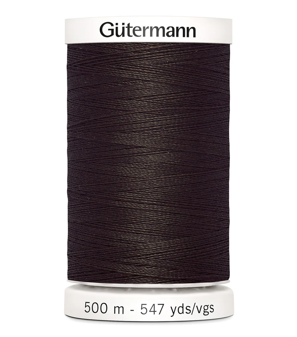 Spool of Gutermann thread on a white background