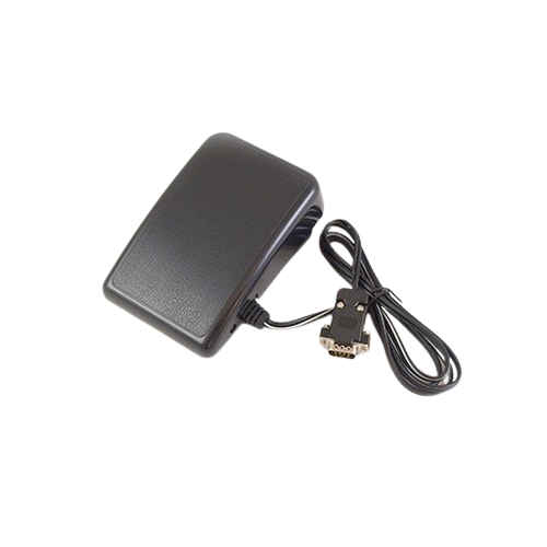 A black foot pedal with an attached black cable and connector, photographed on a plain white background.