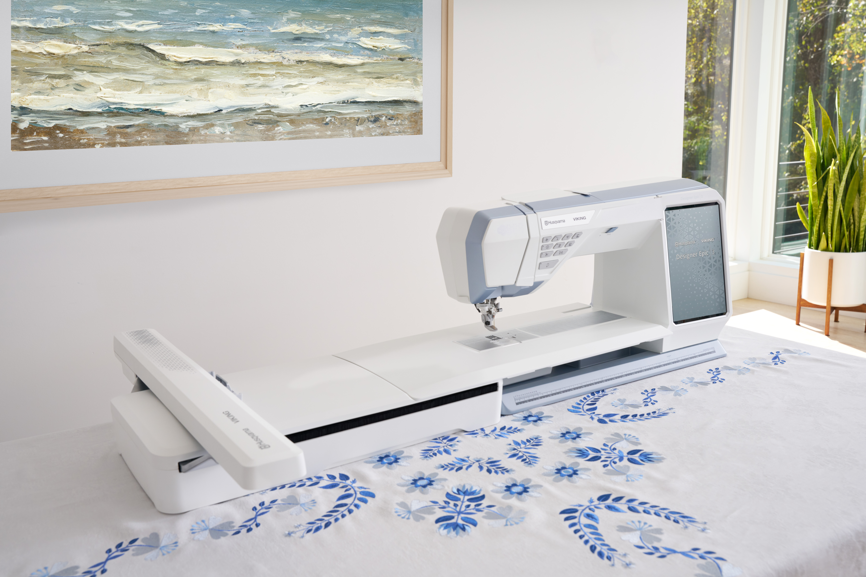 Husqvarna Viking Designer Epic 3 Nordic Frost Sewing and Embroidery Machine Angled on a Table with Embroidery Example
