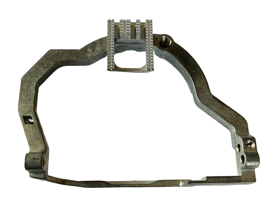 A metallic mechanical part featuring a textured, ribbed top section and pre-drilled mounting holes, shown against a plain white background.