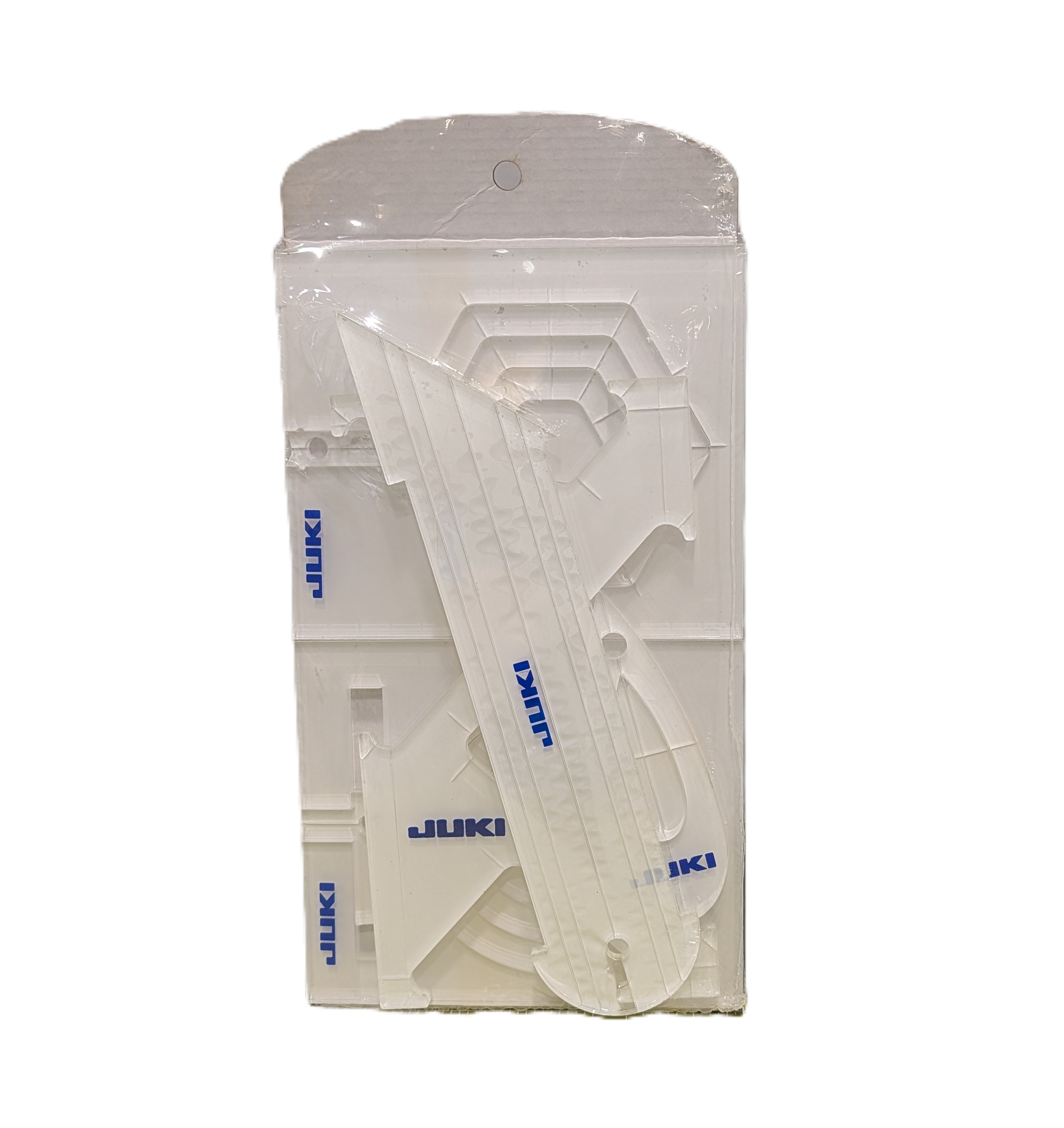 White acrylic ruler kit in a clear plastic hanging blister pack with blue 'JUKI' branding, shown against a plain white background
