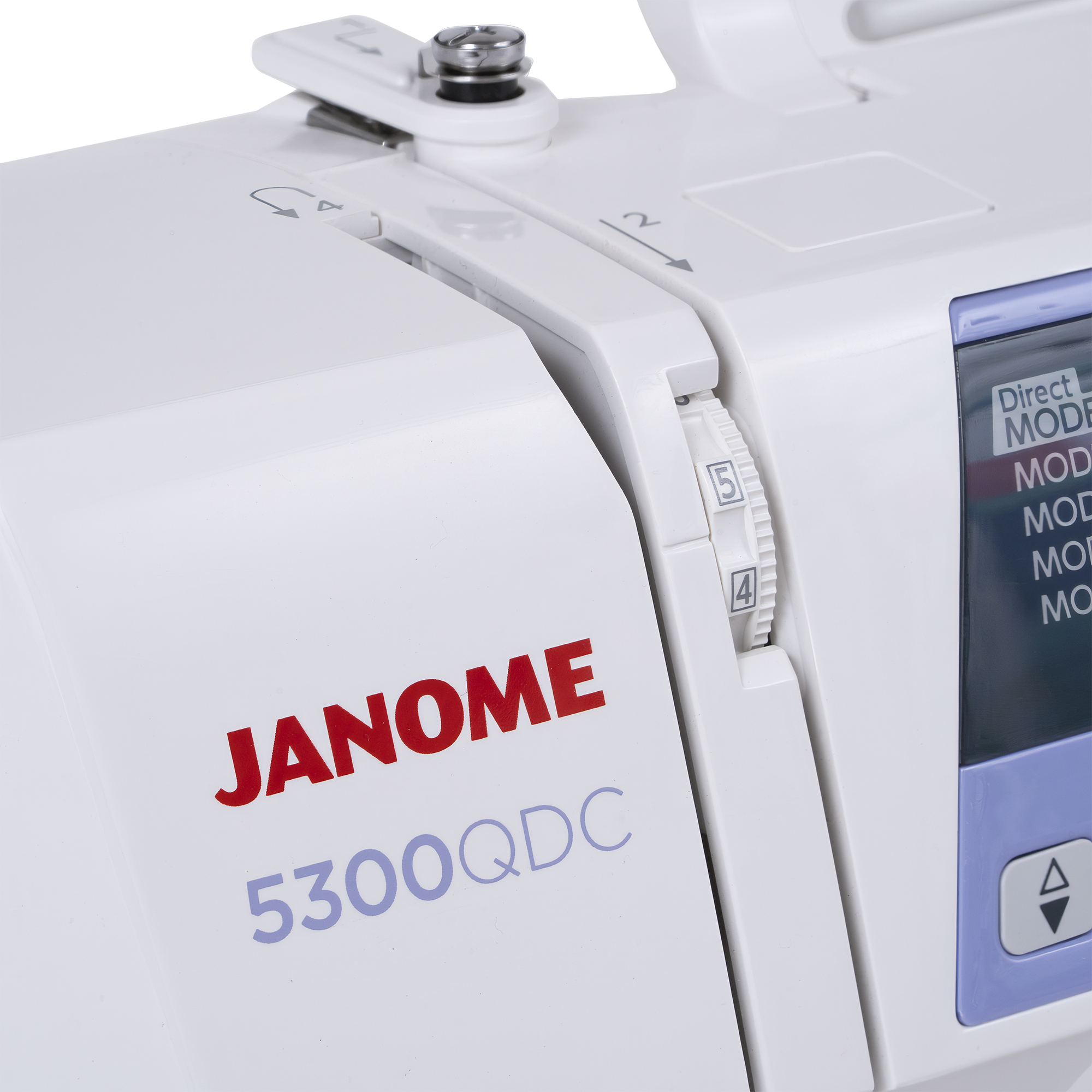 Close-up of a Janome 5300QDC sewing machine showing the white body, red and blue brand text, dial settings, and part of the control panel.