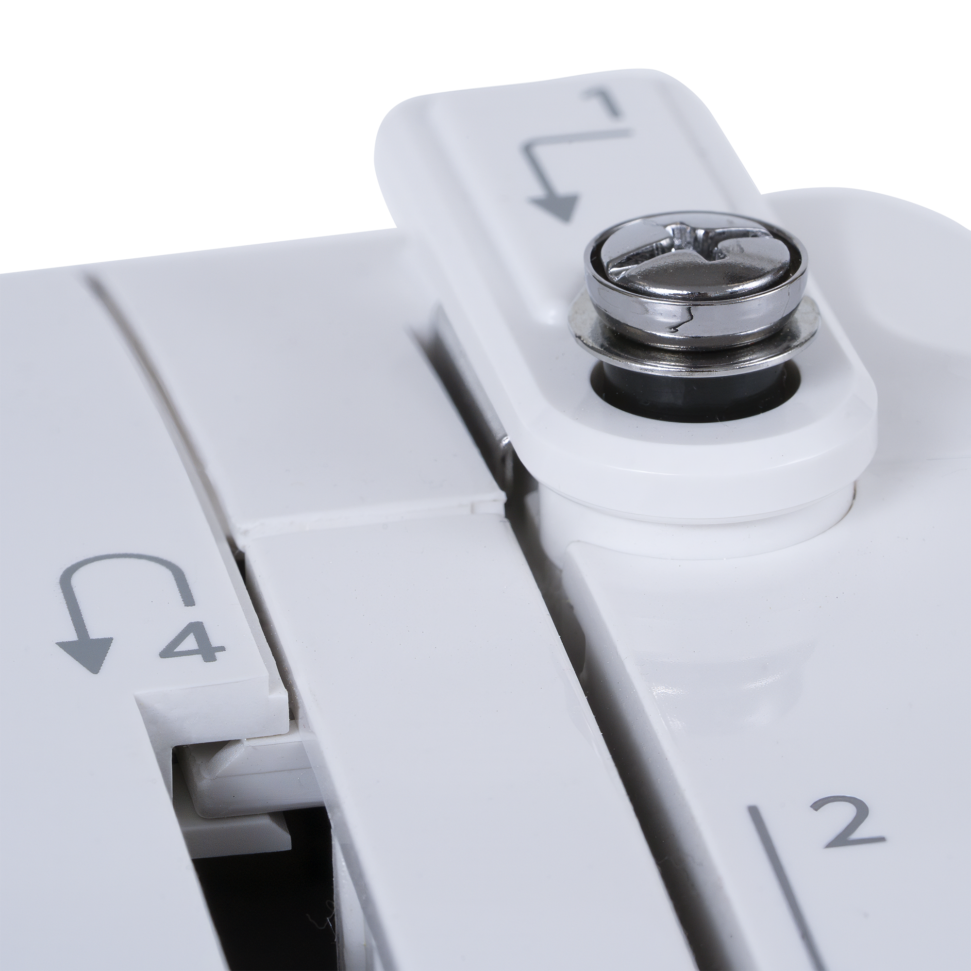 Close-up of a white mechanical device showing adjustment knobs and numbered slots with arrow symbols, photographed on a clean white background.