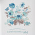A square ceramic tile or coaster featuring a watercolor-style floral bouquet in shades of blue, teal, and taupe on a white background, with the text 'CONTINENTAL M6' printed below.
