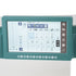 A close-up of a sewing machine's digital control panel with a teal bezel and a large touch screen displaying stitch patterns and settings.