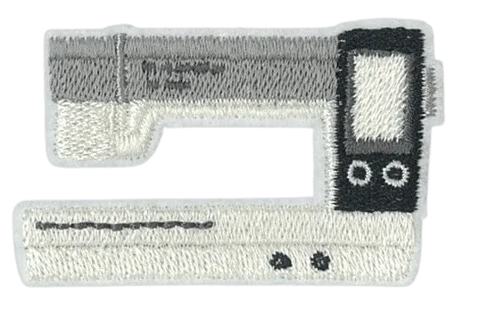 Embroidered patch of a sewing machine on a white background