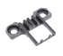 A dark gray metal mechanical component with two circular mounting holes and textured ridges, shown on a plain white background.
