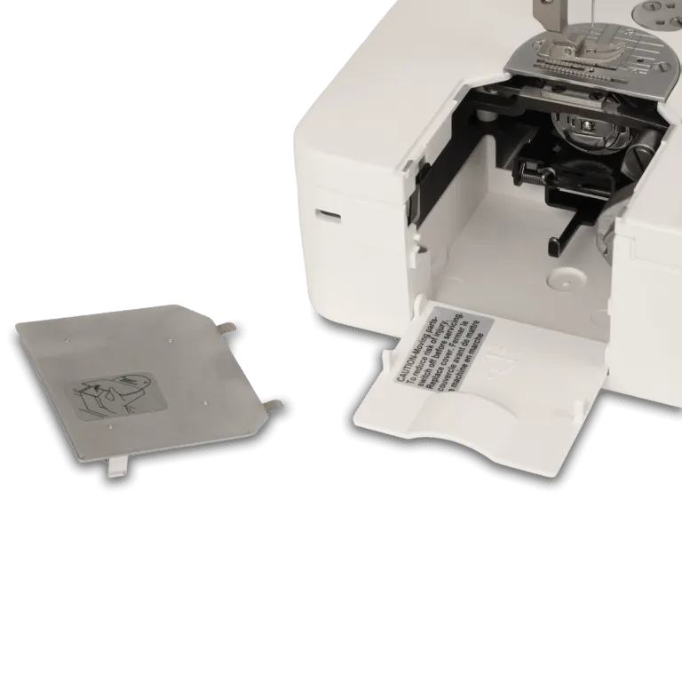 A close-up of a white sewing machine with its front cover open, showing internal components, alongside a detached gray metal plate on a clean white background.