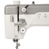 Close-up of a sewing machine head showing the needle area, thread guide, tension dial, and control buttons on a white and gray background.