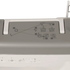 Close-up of a sewing machine top showing a printed instruction diagram with numbered steps and symbols for thread, needle, bobbin, and hook placement.