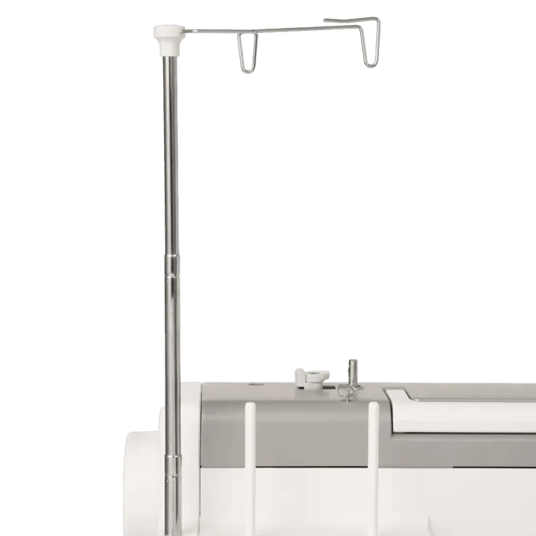 A close-up detail shot of a sewing machine featuring a tall, adjustable silver metal tension dial arm and a white and gray body, set against a solid white background.