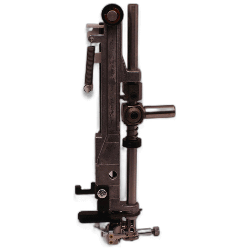 A dark metallic mechanical device or tool component with multiple adjustable parts, photographed against a plain white background.