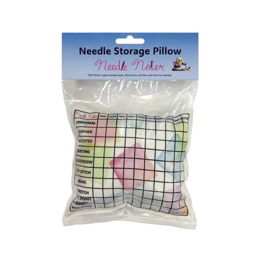 Needle storage pillow with colorful grid pattern in clear packaging on a white background