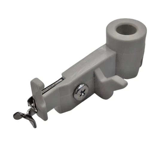 Gray plastic needle threader on a white background