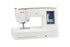 A white Janome Skyline 8 sewing machine with a digital touchscreen display on the side, shown against a solid white background.