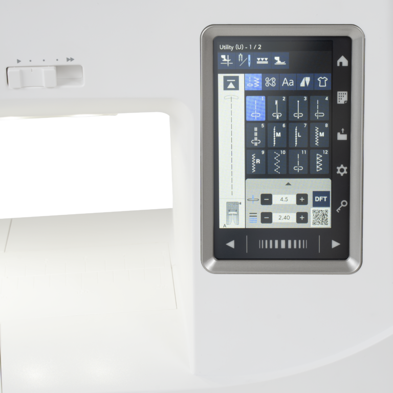 Close-up of a white sewing machine featuring a large, angled digital touch control screen displaying a dark blue and gray user interface.