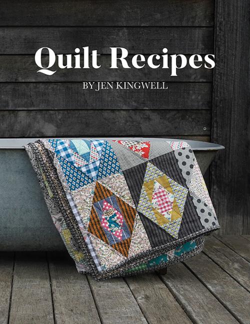 Book titled 'Quilt Recipes' by Jen Kingwell with a quilt on a wooden surface.