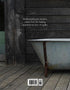 Vintage bathtub on a wooden deck with text and barcode