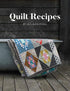 Book titled 'Quilt Recipes' by Jen Kingwell with a quilt on a wooden surface.