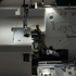 Close-up of a sewing machine with needle and thread