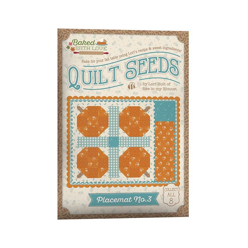 Quilt Seeds placemat with quilt design and branding on a white background