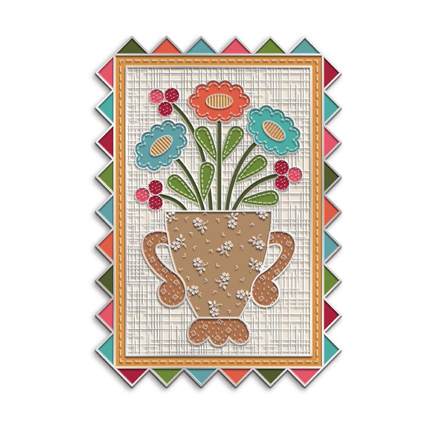 A decorative needle minder with a floral bouquet in a brown vase on a cream grid background, surrounded by a multicolored zigzag border.