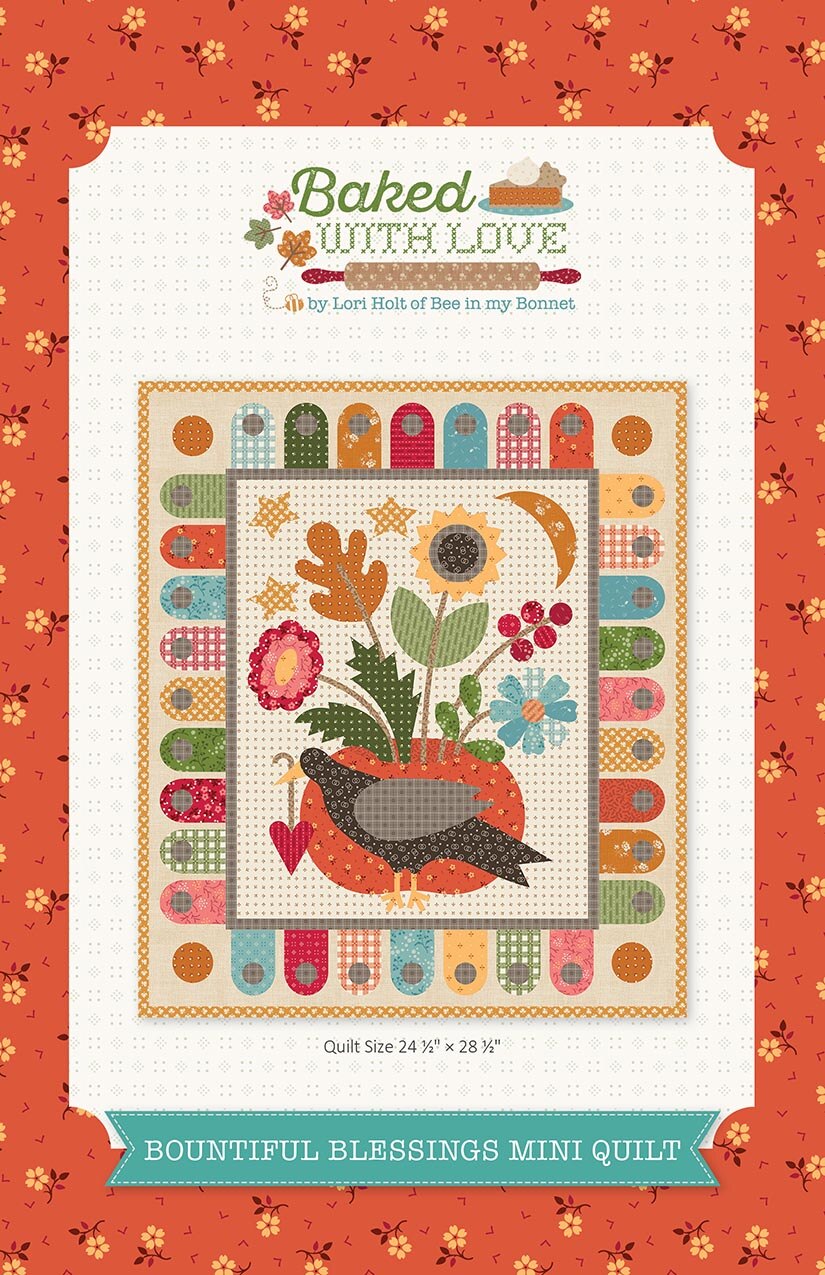 Quilt pattern packaging with colorful design and text on a floral background